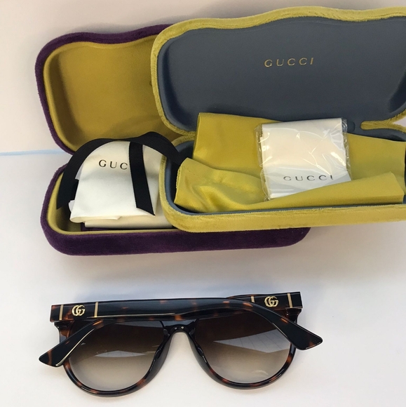 Auth - GUCCI GG0636SK 002 round Gucci sunglass comes in a dark havana frame with main image 11